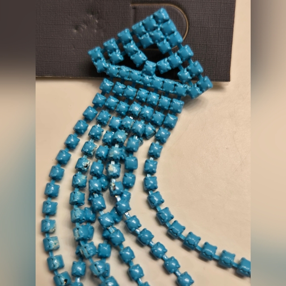 Des boucles d'oreille bleu turquoise - Picture 2 of 5